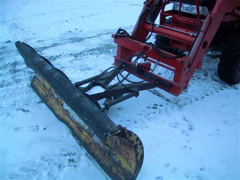 snow plow bent loader arms